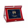 Leather effect plaque box in burgundy color